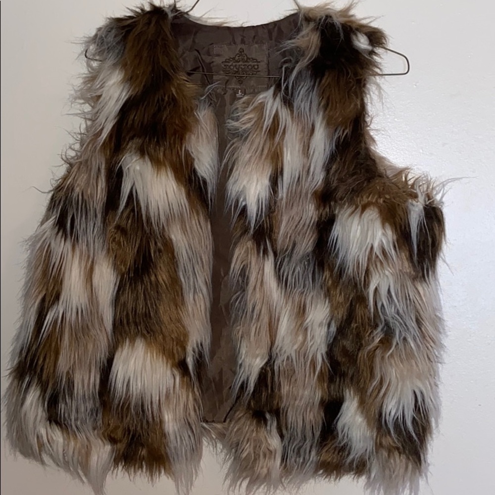 Cow print, long fur vest!